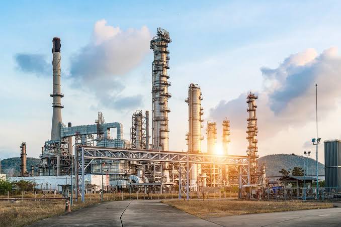 Industrial refinery at sunset